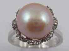 Appraisal: A white metal tests ct gold cultured pearl and diamond