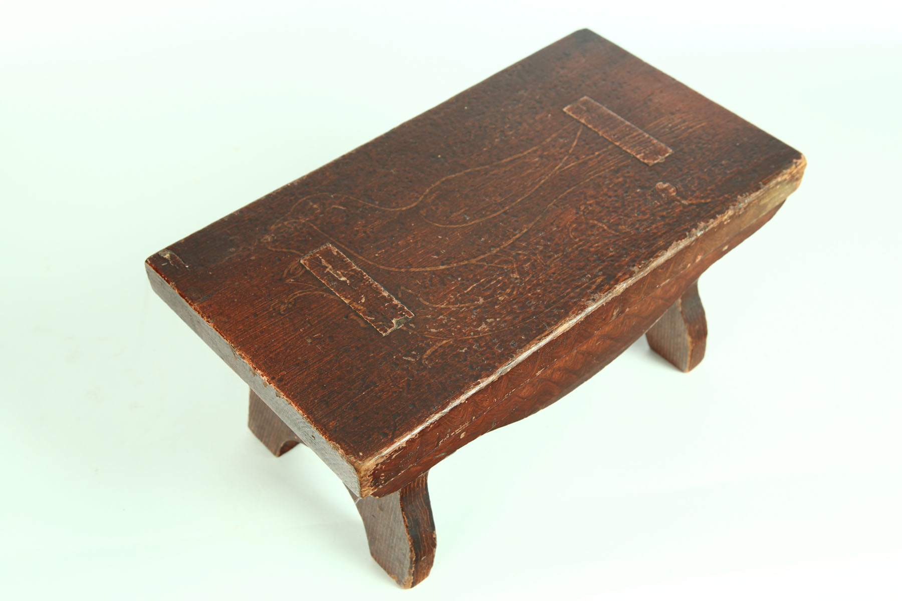 Appraisal: DECORATED FOOTSTOOL American th century pine Grain-painted with design of