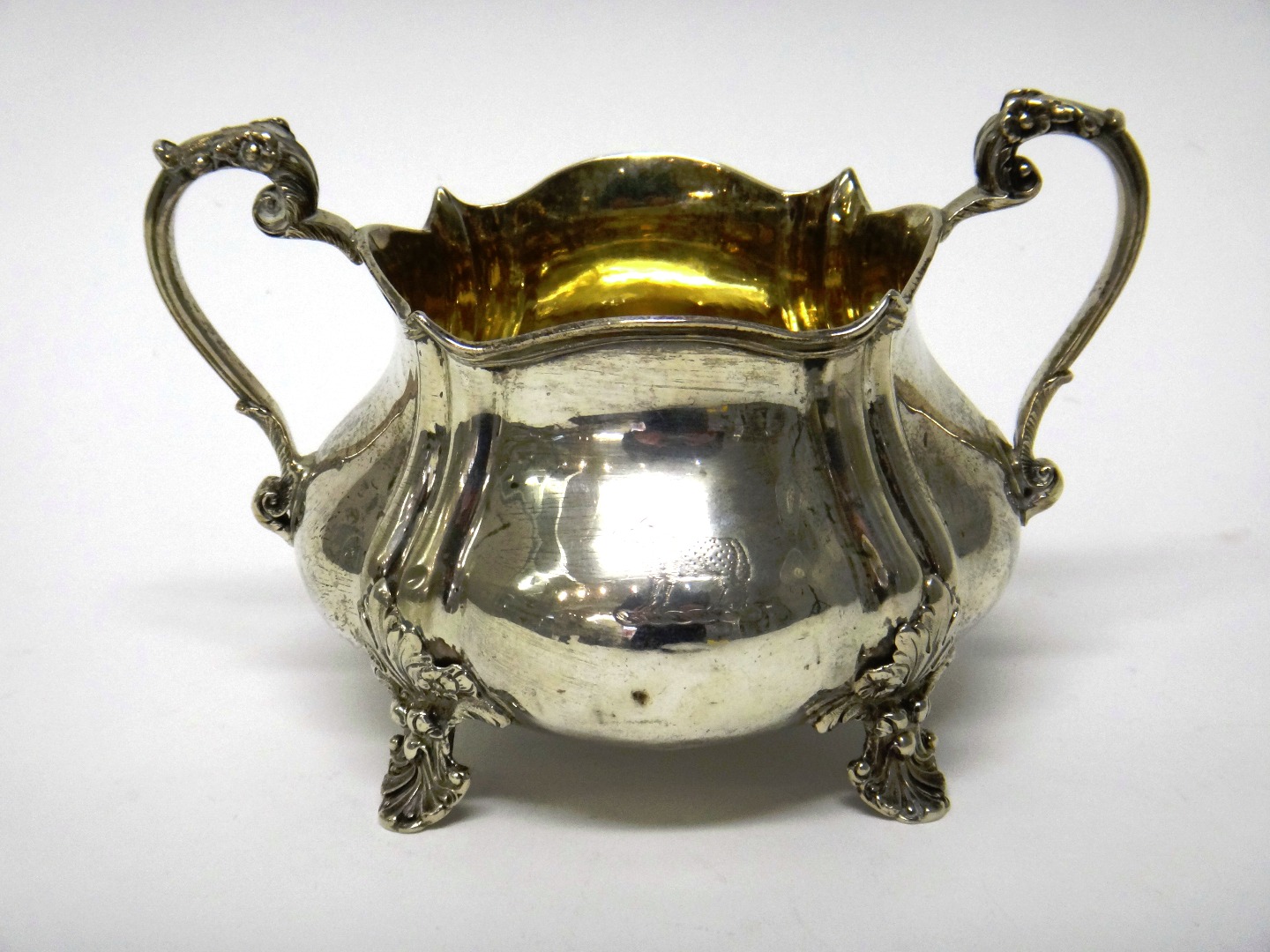 Appraisal: A William IV silver twin handled sugar bowl of squat