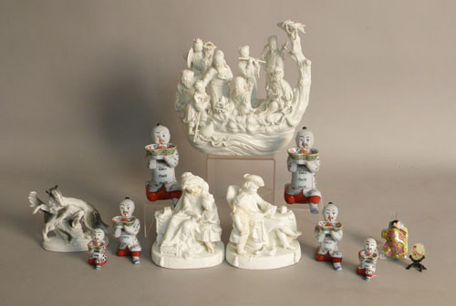 Appraisal: Large figural group together with a smaller pair of figures