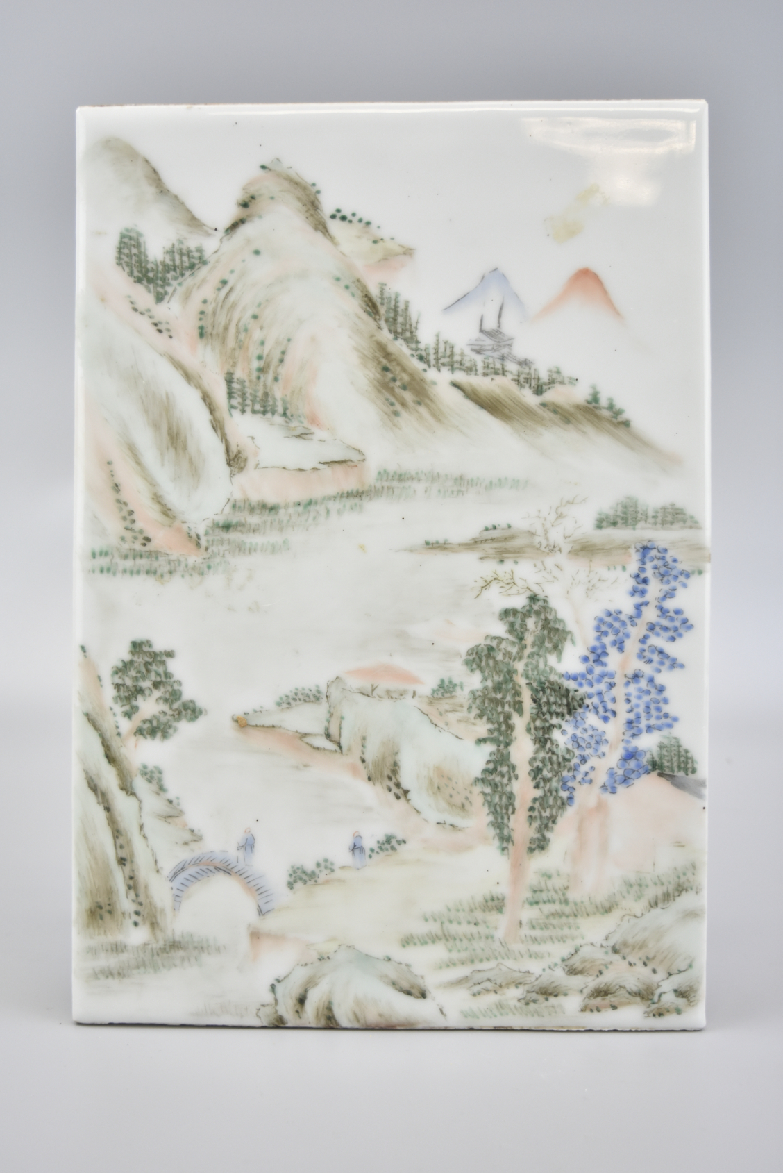 Appraisal: Chinese porcelain plaque painted with mountainous landscape with a cross