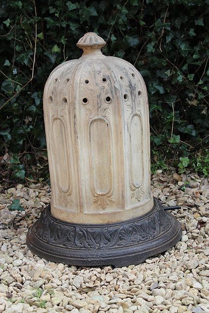 Appraisal: A VICTORIAN AND TERRACOTTA AND CAST IRON CONSERVATORY HEATER the