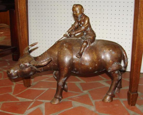 Appraisal: Chinese school th century BOY ON WATER BUFFALO bronze with