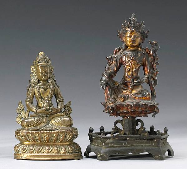 Appraisal: Two small Buddhist metal figures th th Century The first