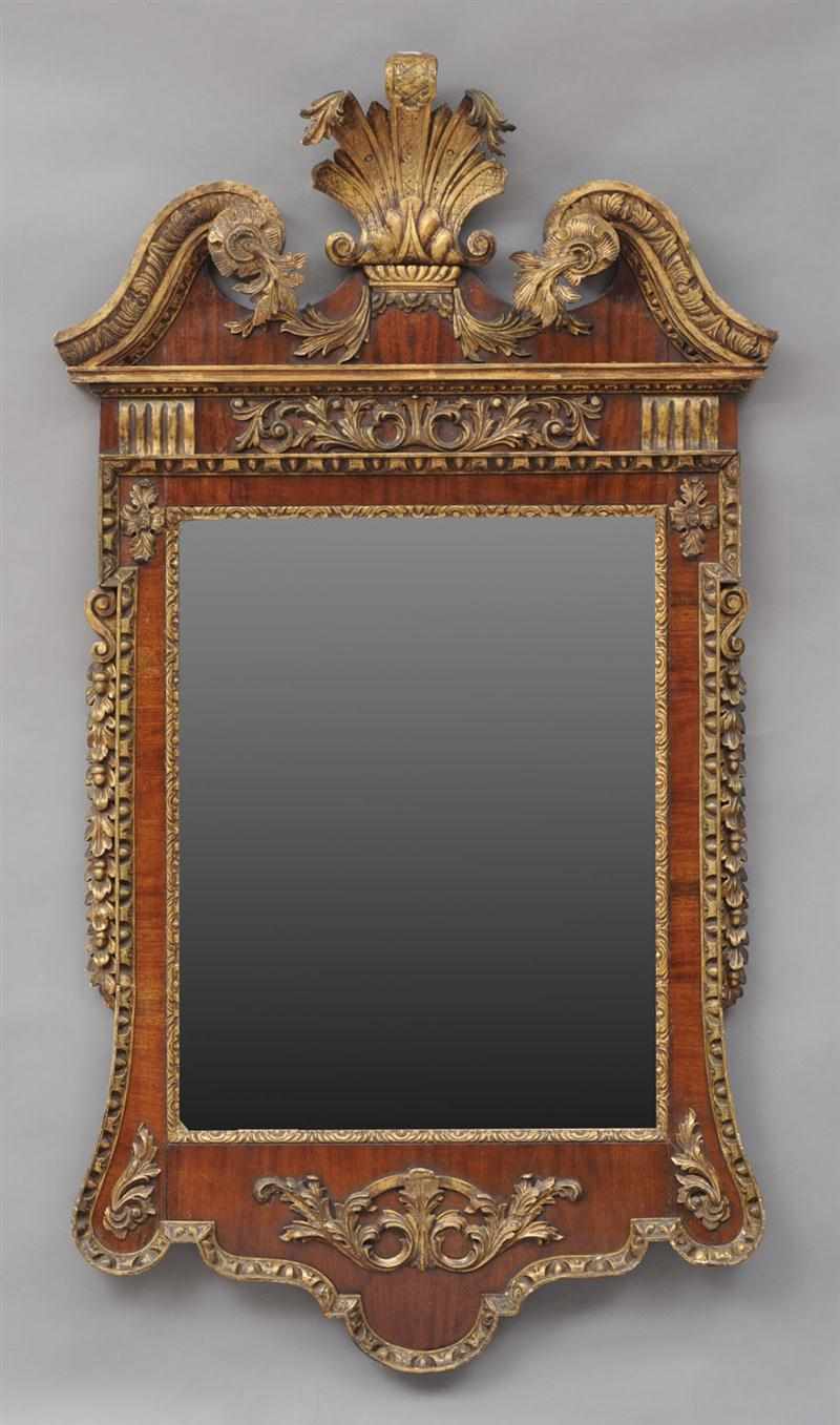 Appraisal: GEORGE II STYLE WALNUT AND PARCEL-GILT MIRROR The rectangular mirror