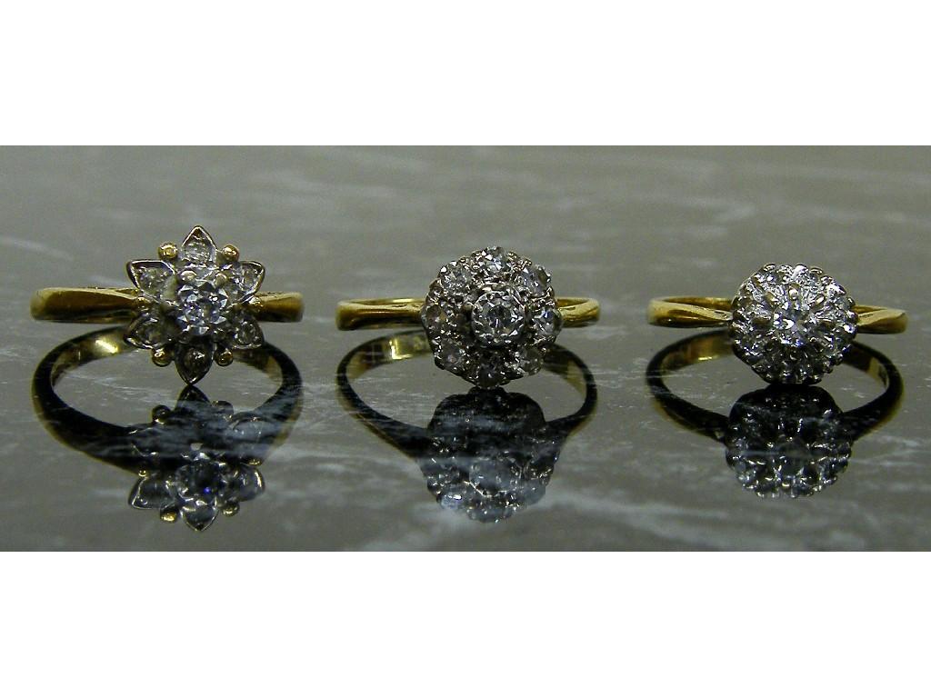 Appraisal: Three ct diamond cluster rings gm