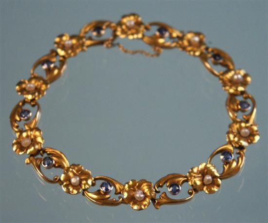 Appraisal: K YELLOW GOLD PEARL AND SAPPHIRE ART NOVEAU FLOWER BRACELET