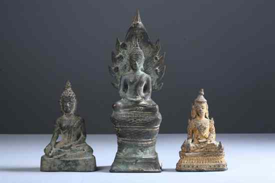 Appraisal: CAMBODIAN BRONZE FIGURE OF BUDDHA AND NAGA Together with two