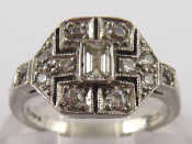 Appraisal: A platinum and diamond ring accompanied by an Insurance valuation