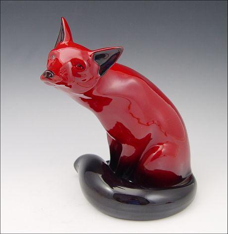 Appraisal: LARGE ROYAL DOULTON FLAMBE SEATED FOX ''h Good red color