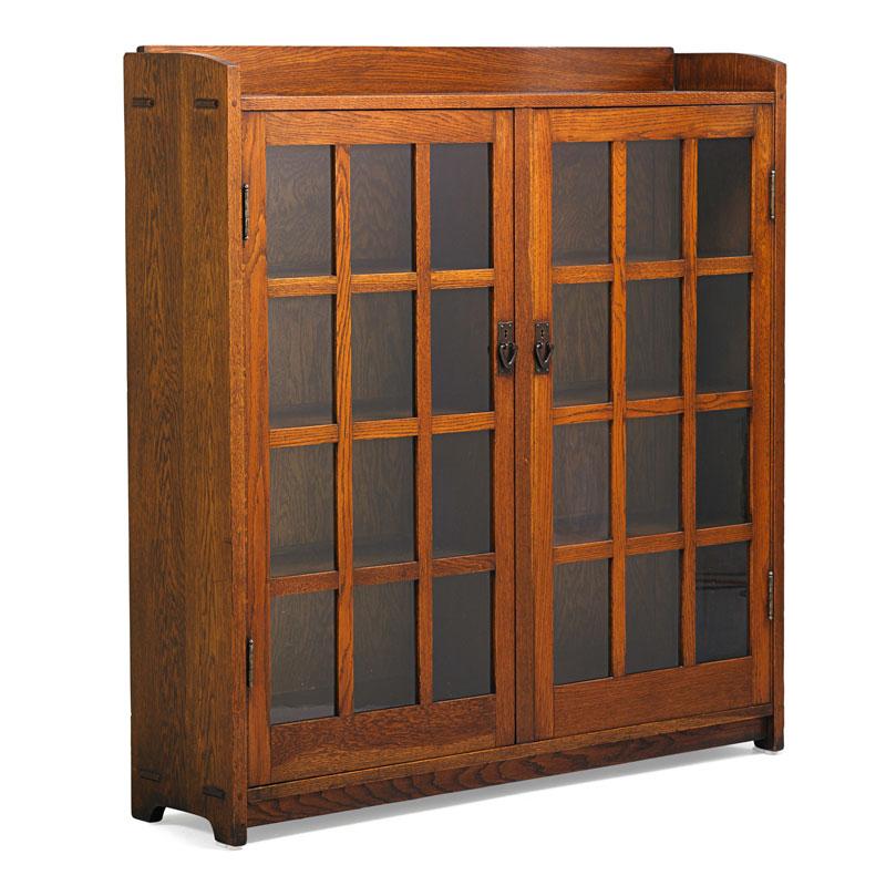 Appraisal: GUSTAV STICKLEY Double-door bookcase Condition Report Light overcoat to very