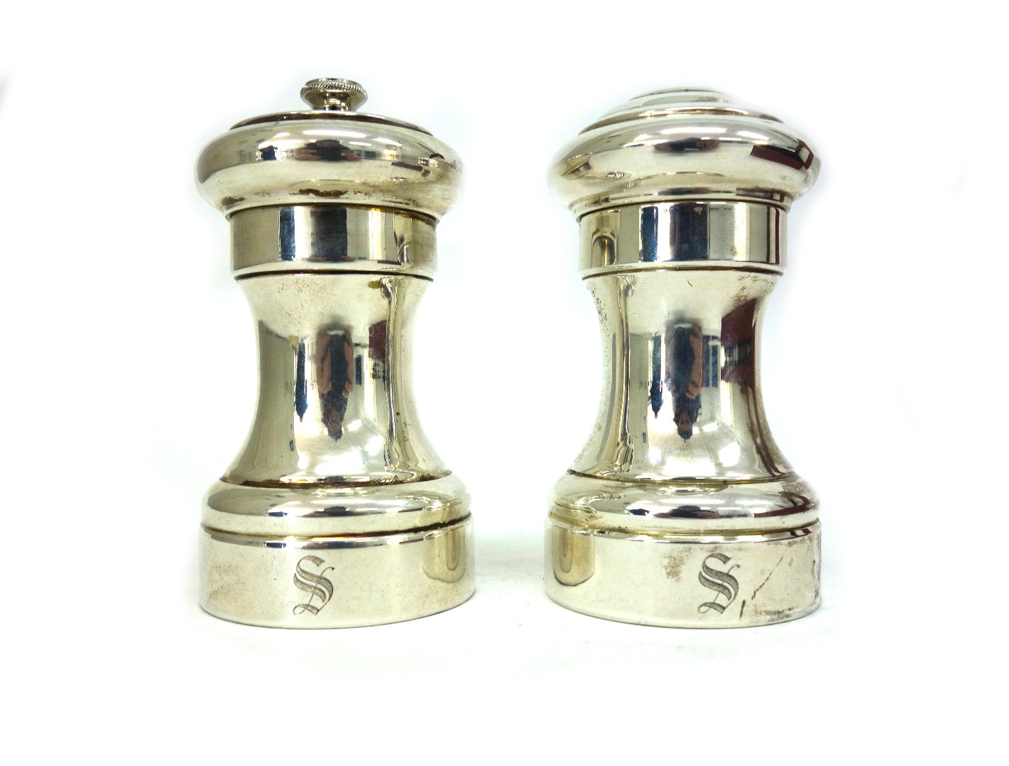 Appraisal: Cartier A cased pair of sterling silver mounted capstan salt