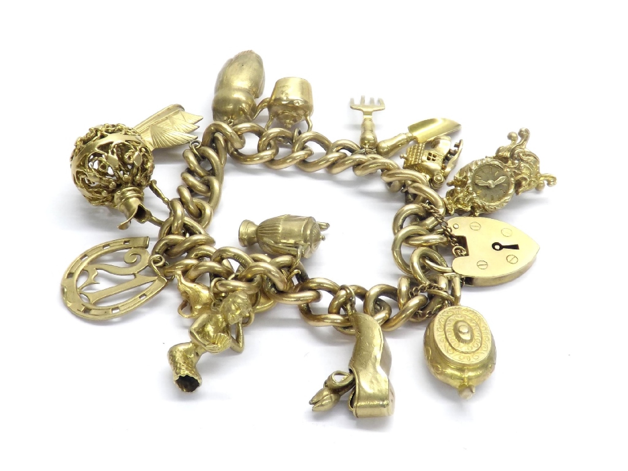 Appraisal: Good ct yellow gold charm bracelet with assorted charms gm