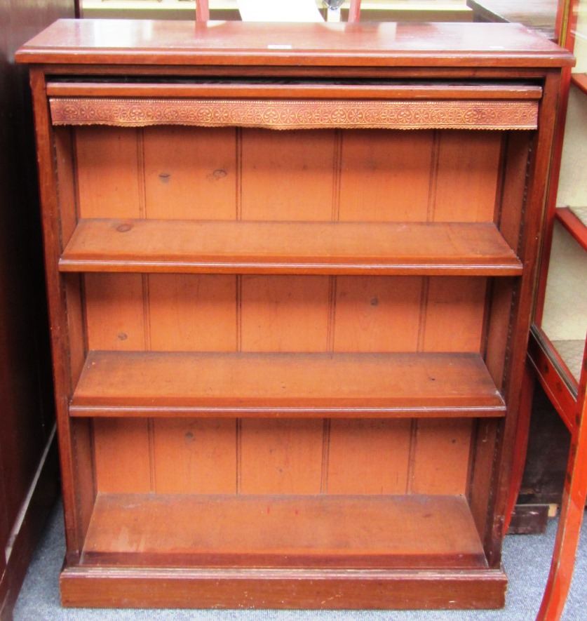 Appraisal: A late th century floor standing mahogany open three tier