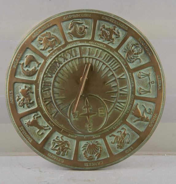 Appraisal: Ceramic Astrological Sun Dial This faux antiqued copper decorative sun