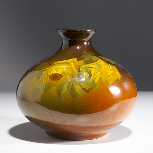 Appraisal: OWENS Utopian bulbous vase painted with yellow roses Impressed mark