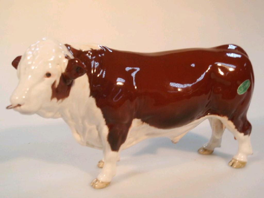 Appraisal: A Beswick figure of a Hereford brown and white bull