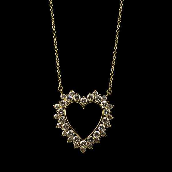 Appraisal: Tiffany Co k Diamond Heart Pendant Tiffany Co k yellow