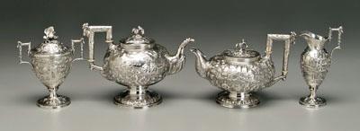 Appraisal: Kirk repousse silver tea service floral bird and architectural repousse