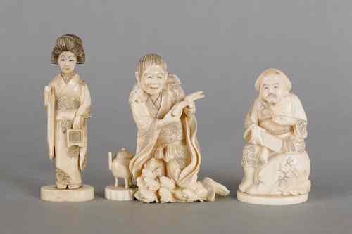 Appraisal: Three Japanese carved ivory figures ca h