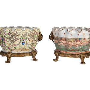 Appraisal: A Pair of United Wilson Gilt Metal Mounted Scalloped Porcelain