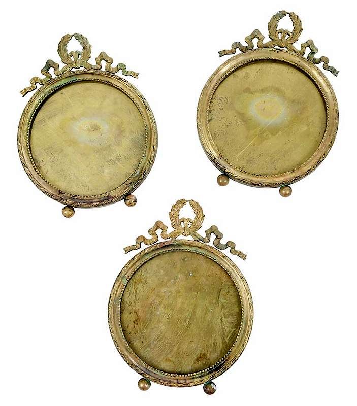 Appraisal: French Round Bronze Frames French th century Louis XVI style