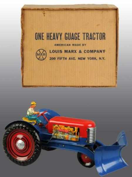 Appraisal: Pressed Steel Marx Tractor Toy Description American Nice lithographed engine