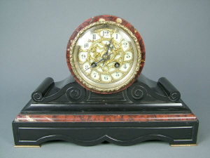 Appraisal: A late th century Continental marble cased mantel clock the