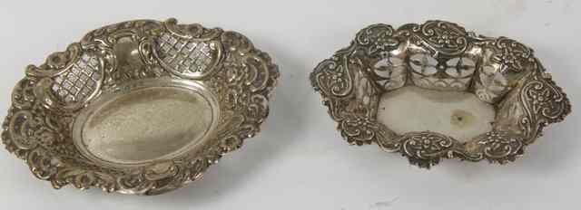 Appraisal: A shaped oval silver bonbon dish MJJ Birmingham embossed scrolls