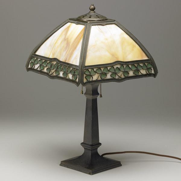 Appraisal: HANDEL Teroca table lamp its four-sided shade with green clover