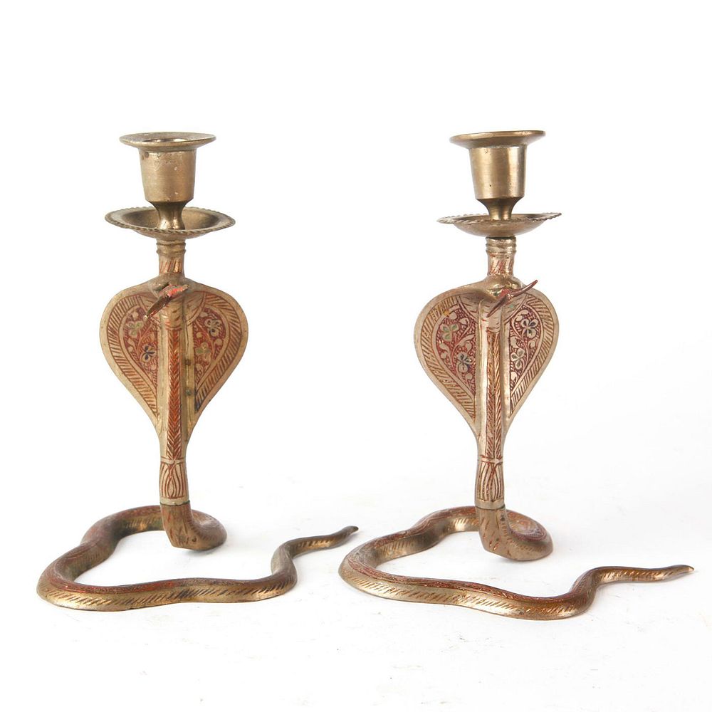 Appraisal: PAIR OF BRONZE INDIAN COBRA CANDLE STANDS Engraved design Green