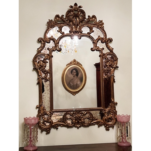 Appraisal: Antique style gilt Rococo revival mirror with pierced scrolling crest