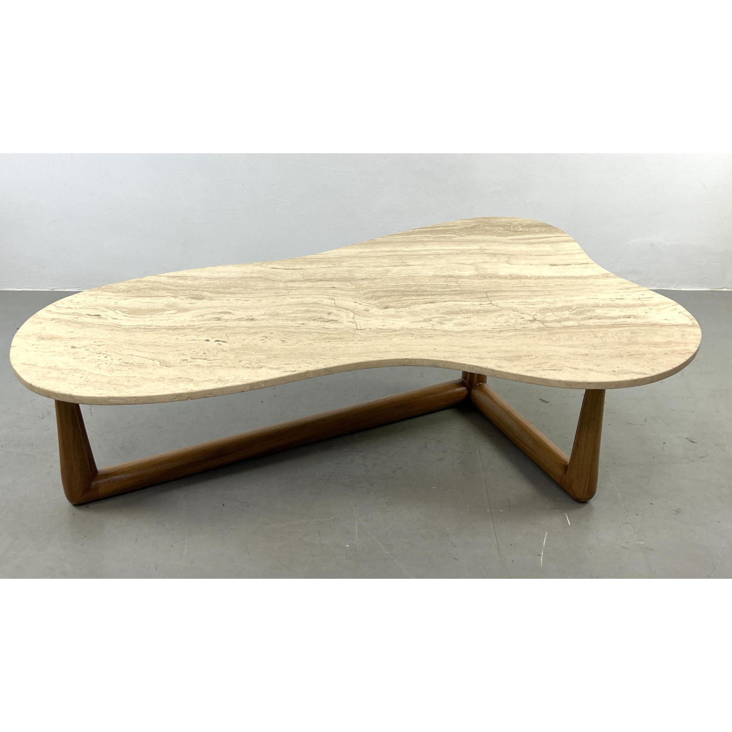 Appraisal: Robsjohn Gibbings style Travertine Marble Walnut Coffee Table Boomerang form