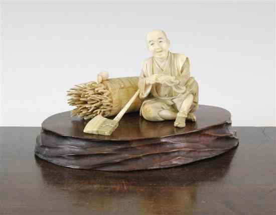 Appraisal: A good Japanese ivory figure of a woodsman Meiji period