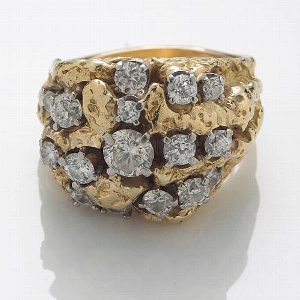 Appraisal: A diamond and k bicolor gold ring estimated total diamond