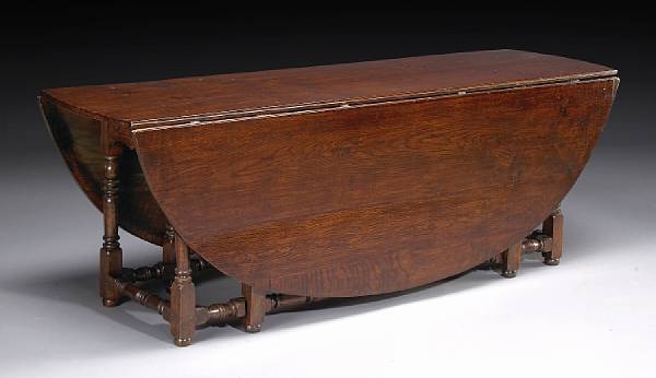 Appraisal: An imposing William and Mary style oak gateleg table partially