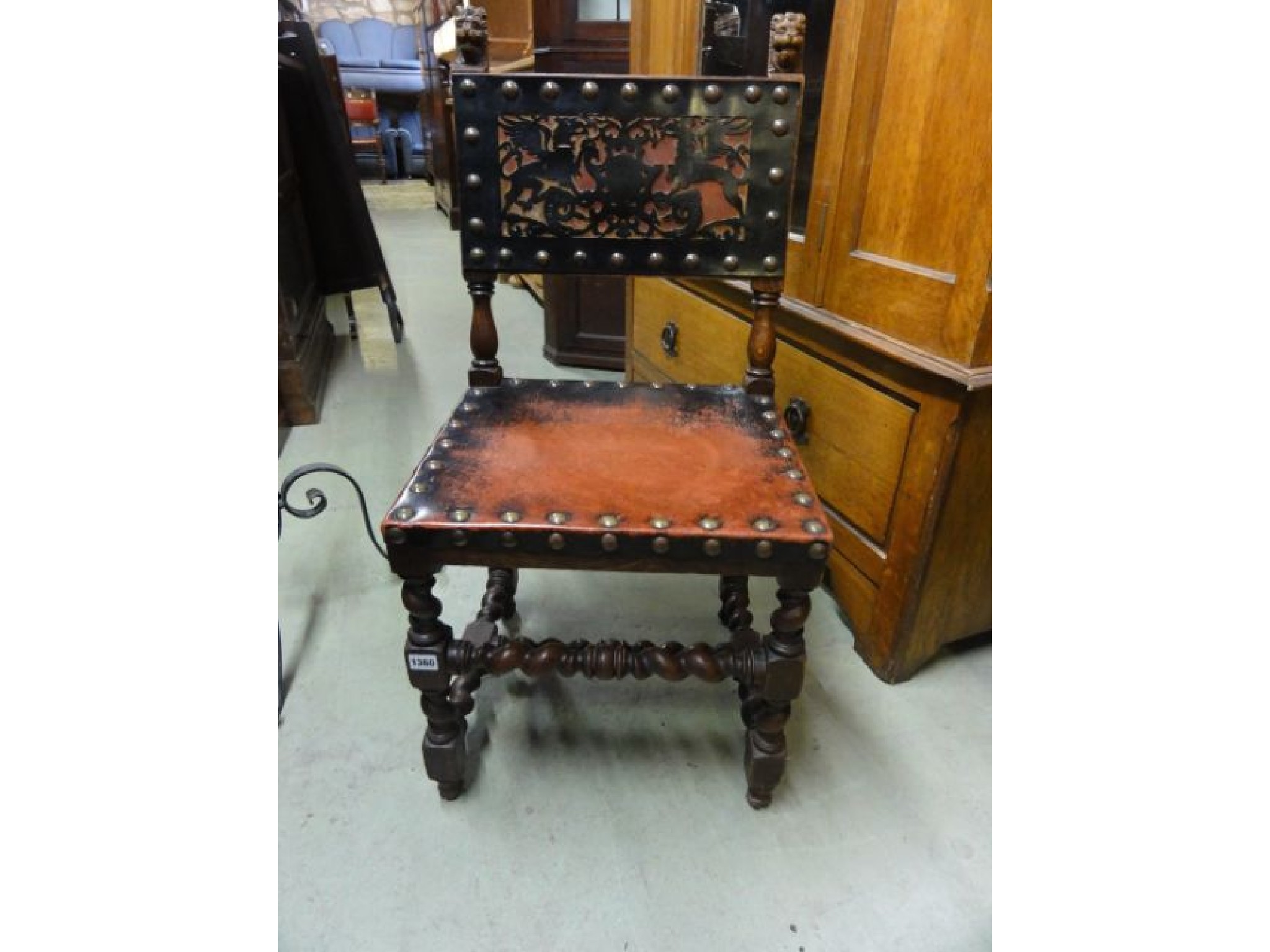 Appraisal: A Victorian oak framed single chair with leather studded seat