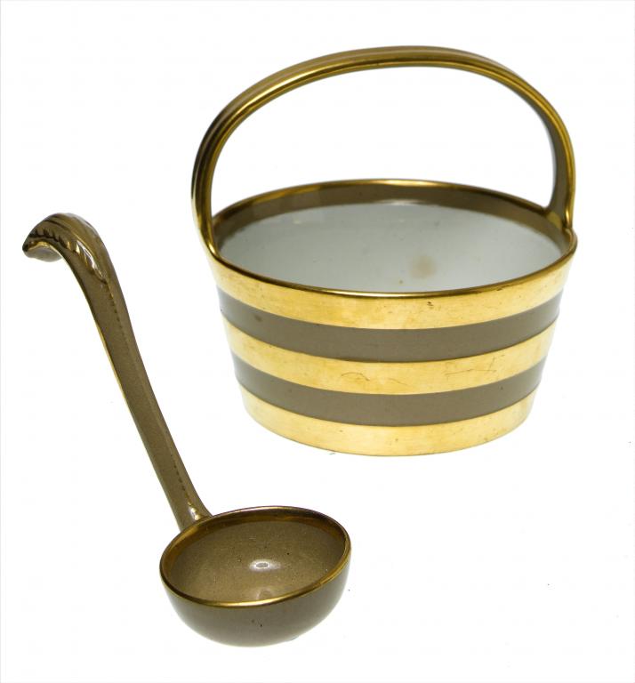 Appraisal: A STAFFORDSHIRE GILT DRABWARE CREAM PAIL AND LADLE the pail