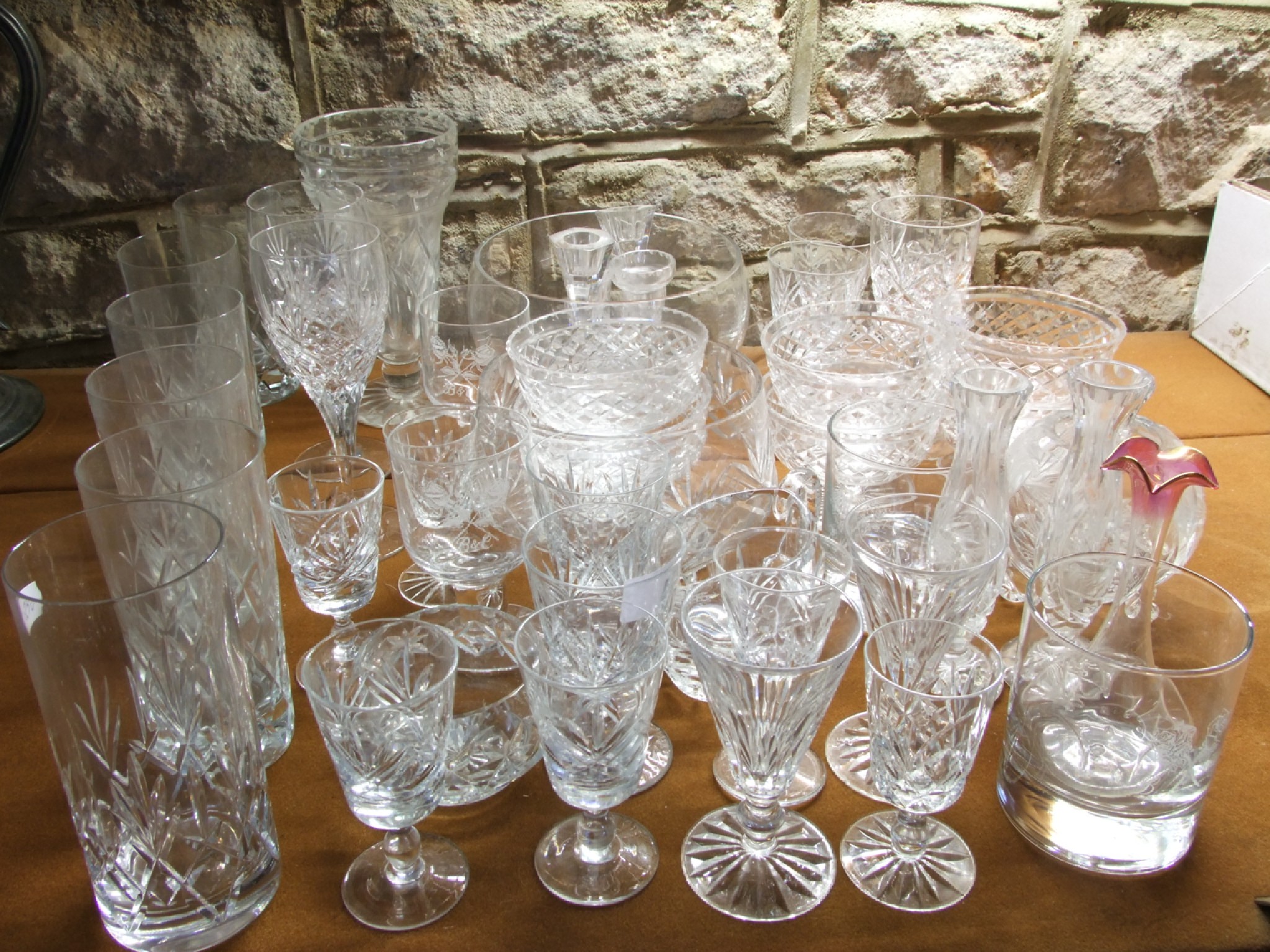 Appraisal: A quantity of clear cut drinking glasses to include wines