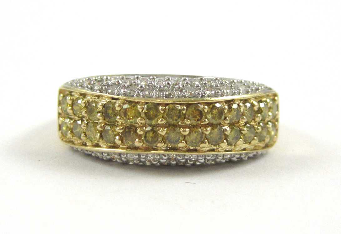 Appraisal: FANCY YELLOW DIAMOND AND FOURTEEN KARAT GOLD RING The yellow