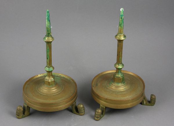 Appraisal: Pair of th Century brass candlesticks with lion feet h