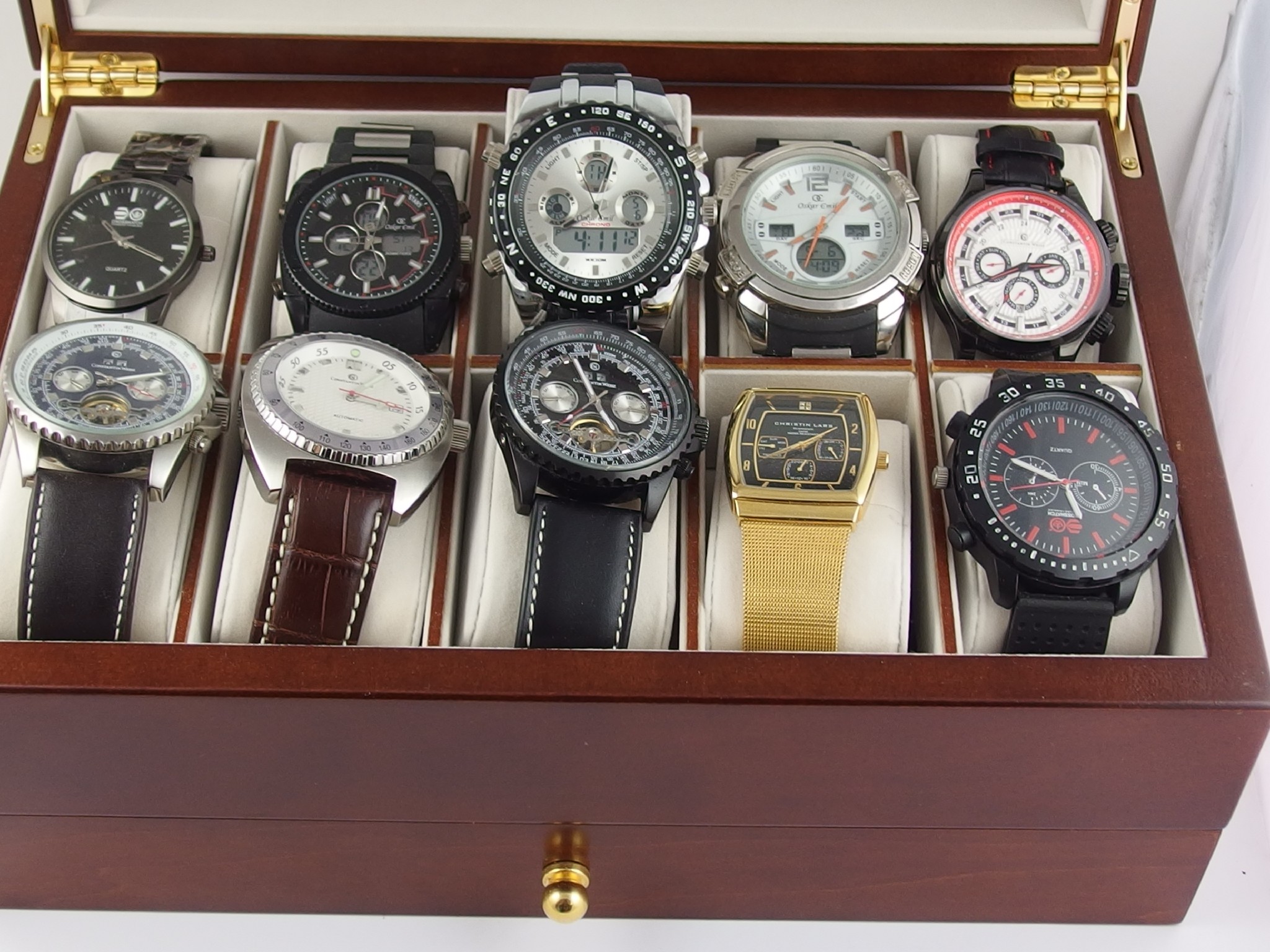 Appraisal: A collection of ten gents fashion watches to include Christian