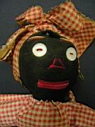 Appraisal: BLACK CLOTH DOLL Button eyes embroidered face gingham checked dress