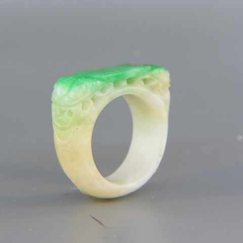 Appraisal: Chinese Carved Jade Ring white jade with green at top