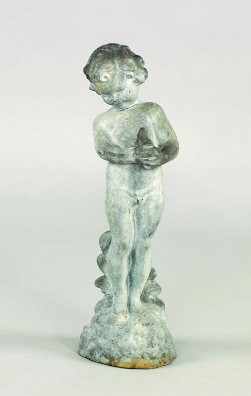 Appraisal: Lead garden fountain of a young child th c holding