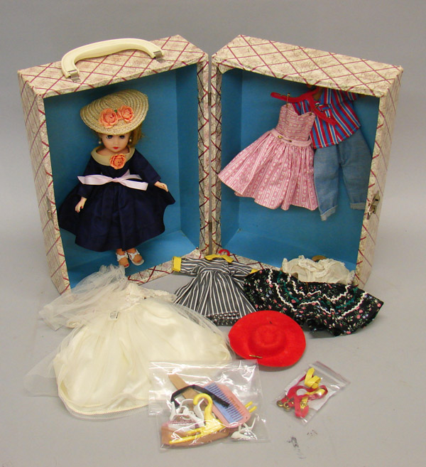 Appraisal: Lot P in circle vinvyl fashion doll with suitcase and