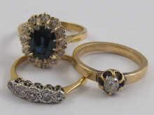 Appraisal: A mixed lot comprising two carat gold diamond rings and