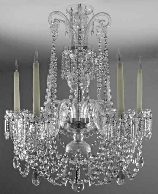 Appraisal: A cut glass chandelier hung festoons of prismatic drops from