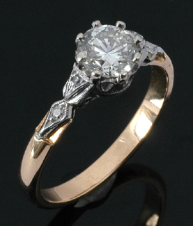 Appraisal: A diamond solitaire ring The round brilliant cut diamond weighing