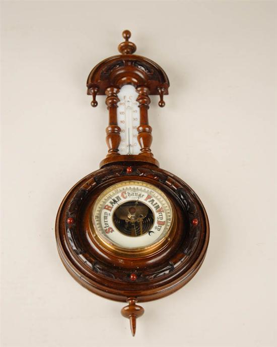 Appraisal: A th C Silesian Aneroid Wheel Barometer in a carved